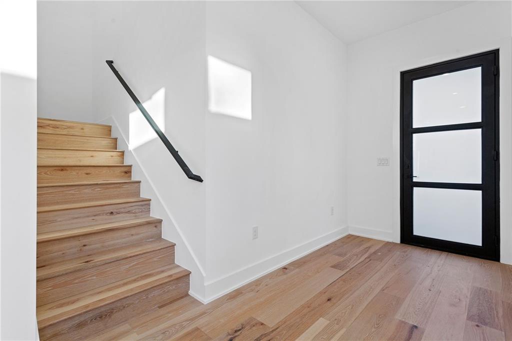 1004 Lott Avenue Austin, TX 78721 - Photo 6 of 39 a view of entryway with wooden floor