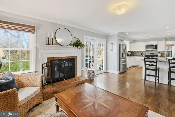 a bedroom with furniture and wooden floor