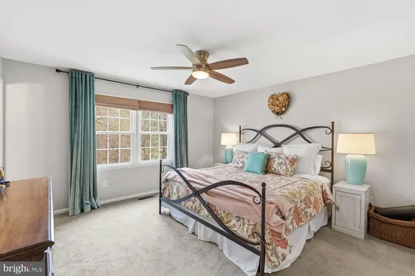 a view of a workspace with furniture and a workspace