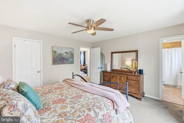 a view of road and house in the background