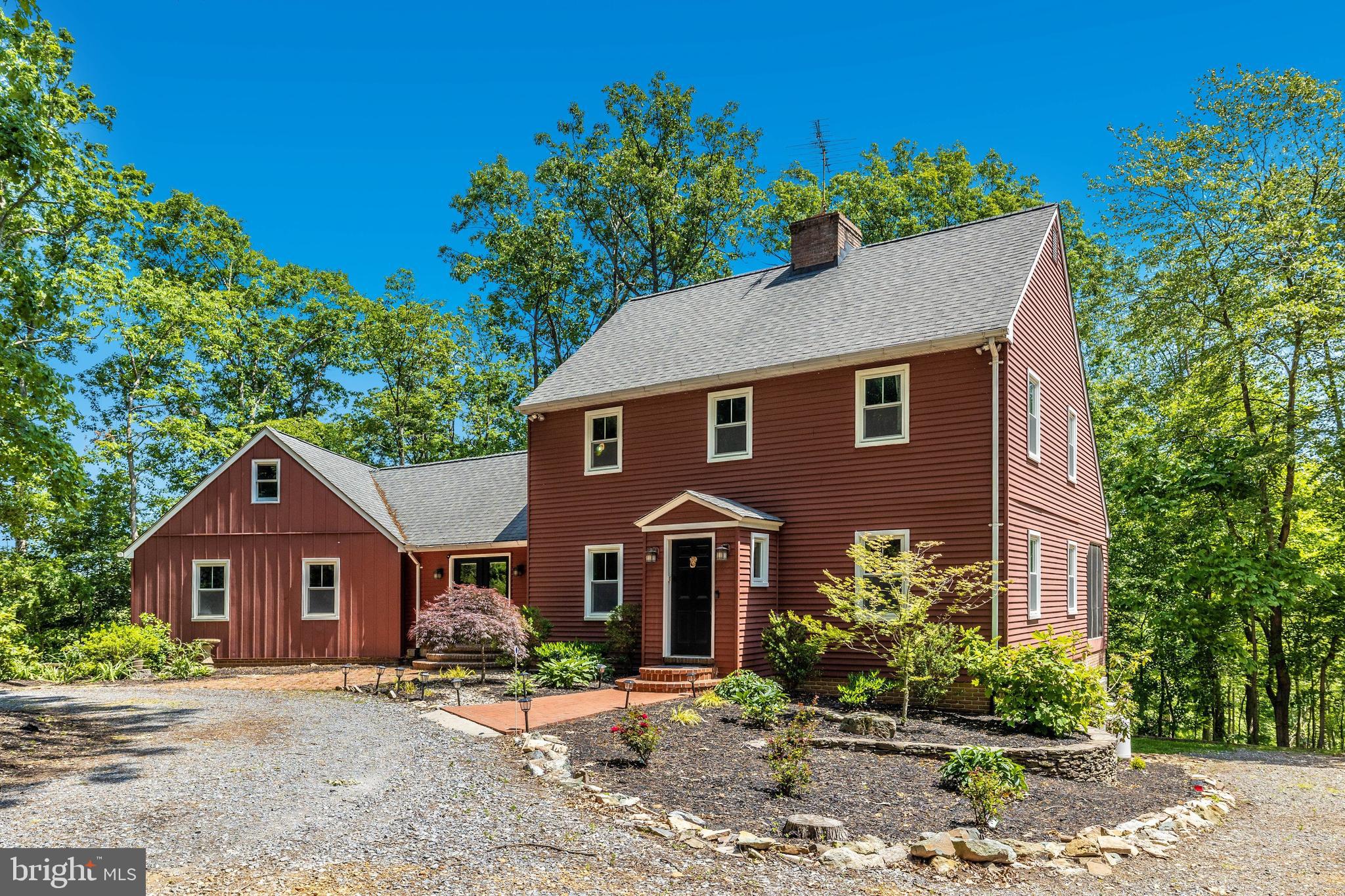 Welcome home to your private paradise on 5 acres!
