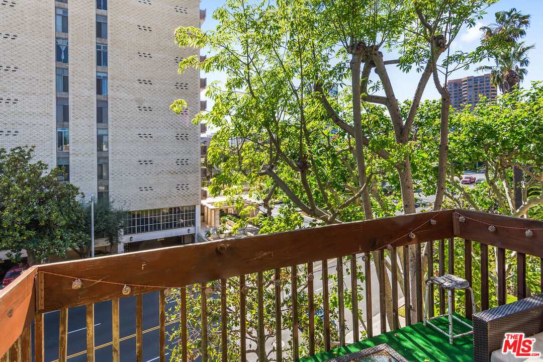 1340 South Beverly Glen Boulevard, Unit 307 Los Angeles, CA 90024 - Photo 12 of 18 a view of balcony with a plant