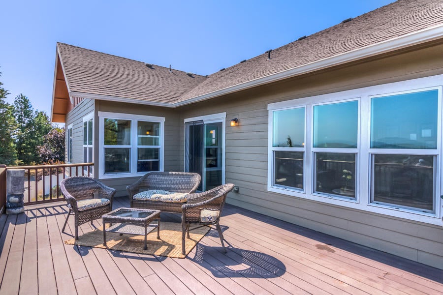 Deck off the kitchen/living room looks to Smith Rock, Mt. Washington, Mt. Jefferson. Spectacular views!