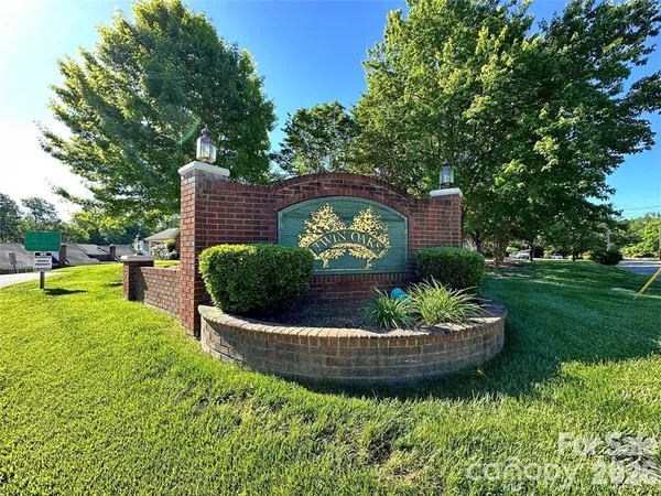 a view of a back yard of the house and a garden