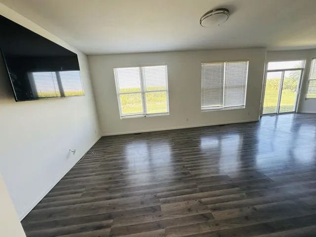 a view of livingroom with furniture and wooden floor