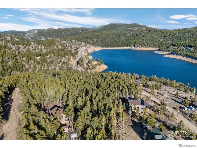 a view of a building with sitting area