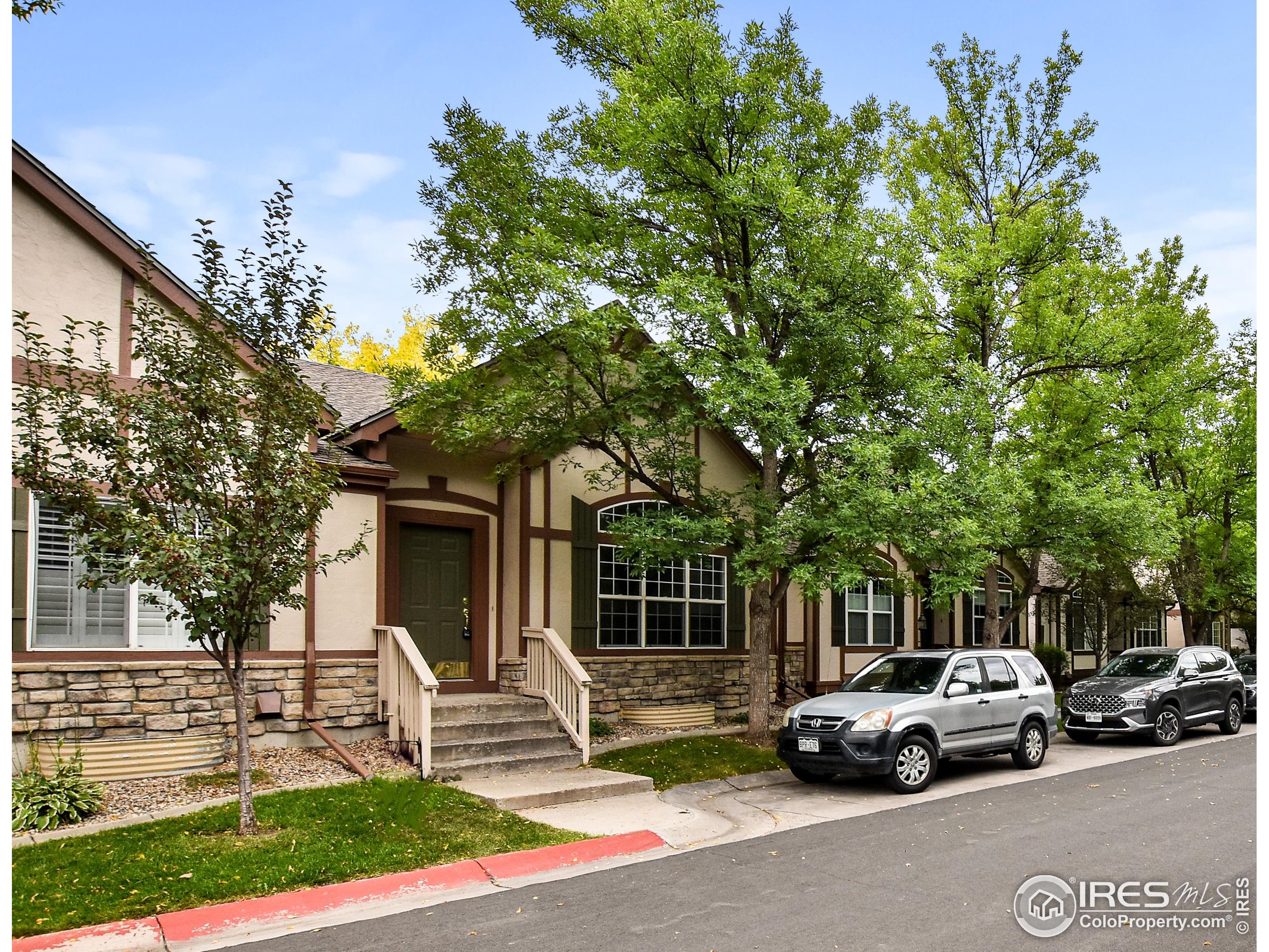 1680 Foxbrook Way Fort Collins, CO 80526 - Photo 2 of 42 a car parked in front of a house