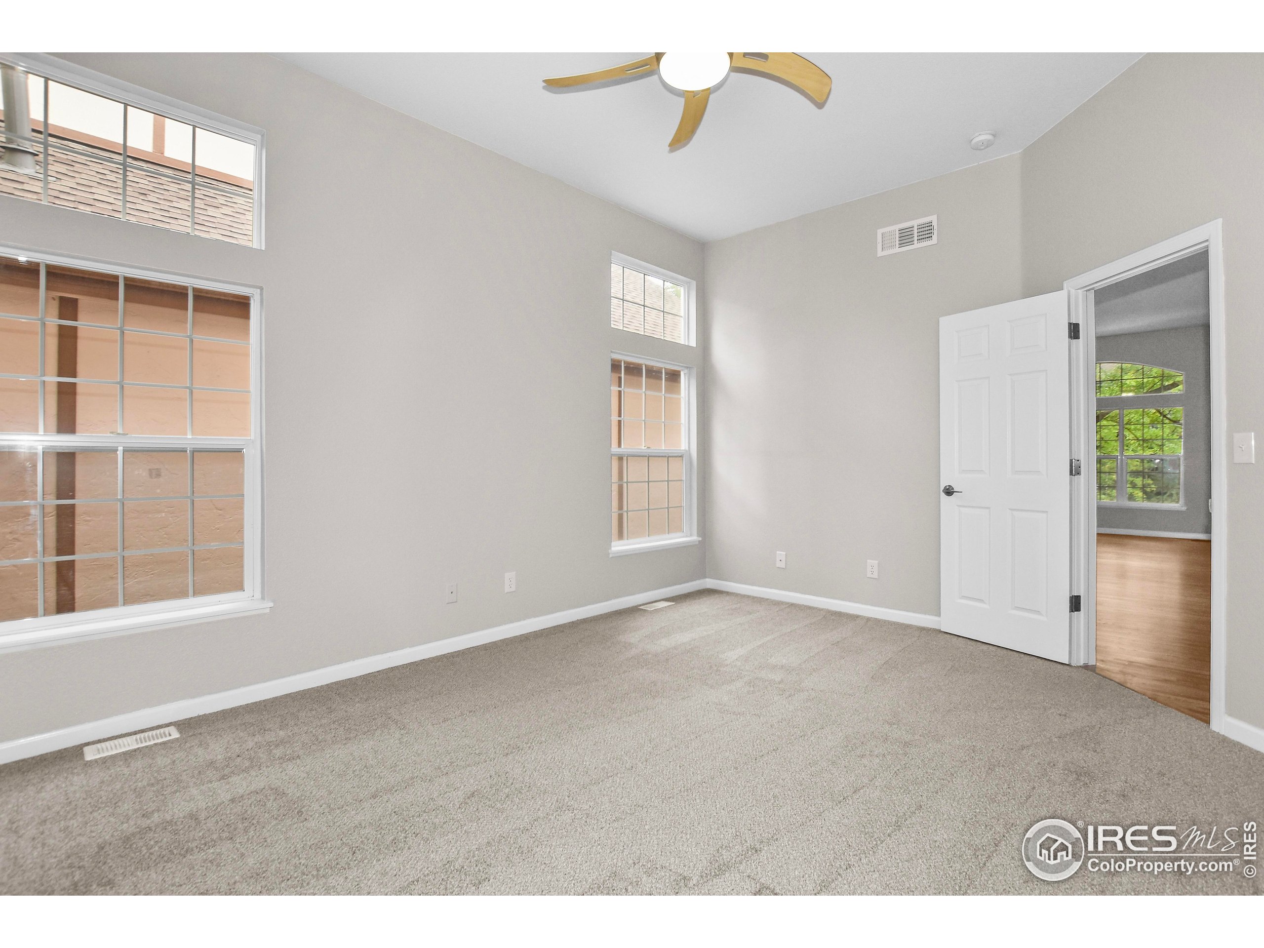 1680 Foxbrook Way Fort Collins, CO 80526 - Photo 26 of 42 a view of an empty room with a window