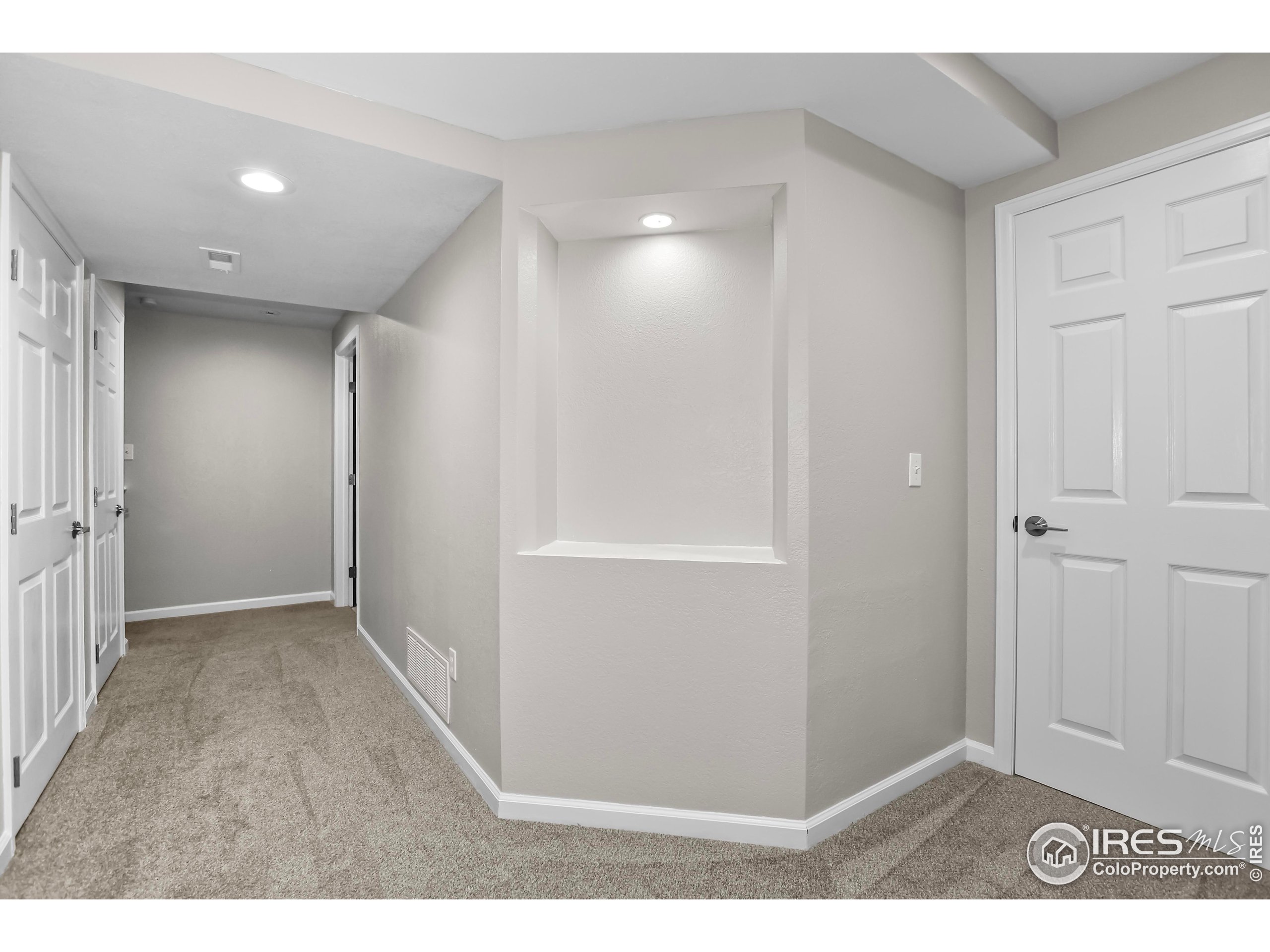 1680 Foxbrook Way Fort Collins, CO 80526 - Photo 35 of 42 a view of hallway with an empty space