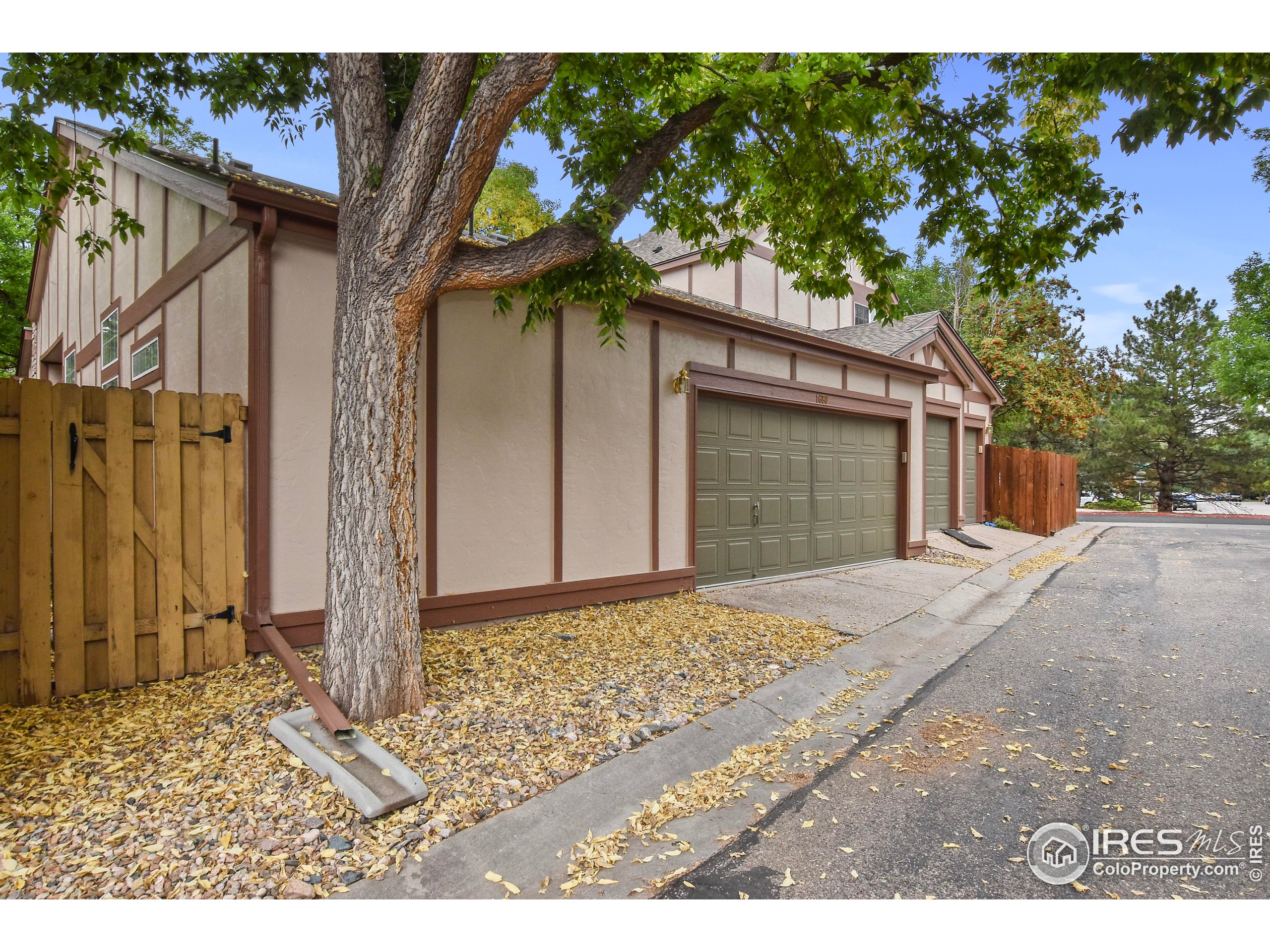 1680 Foxbrook Way Fort Collins, CO 80526 - Photo 39 of 42 a front view of a house with a yard