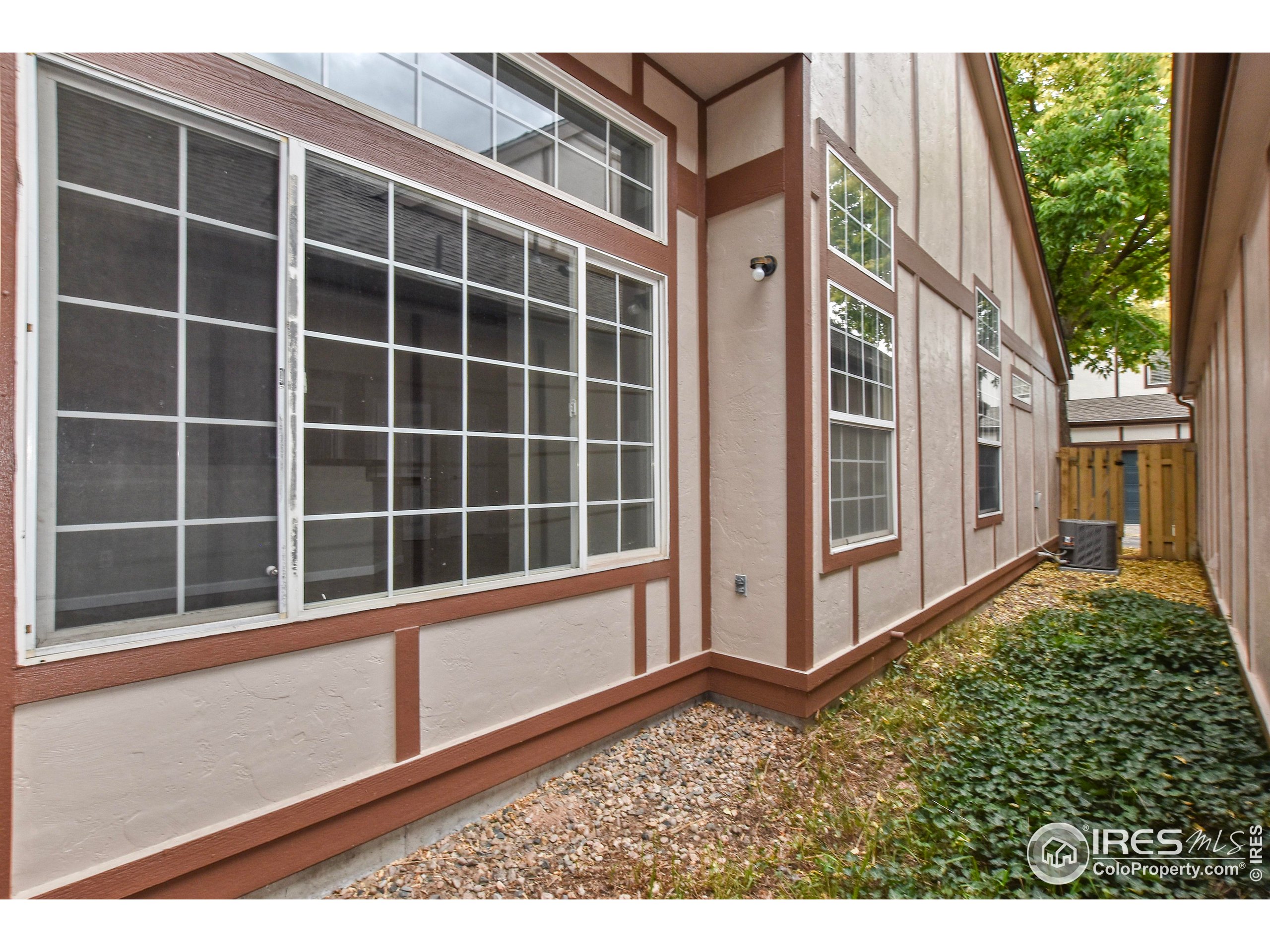 1680 Foxbrook Way Fort Collins, CO 80526 - Photo 40 of 42 a view of a house with a large window