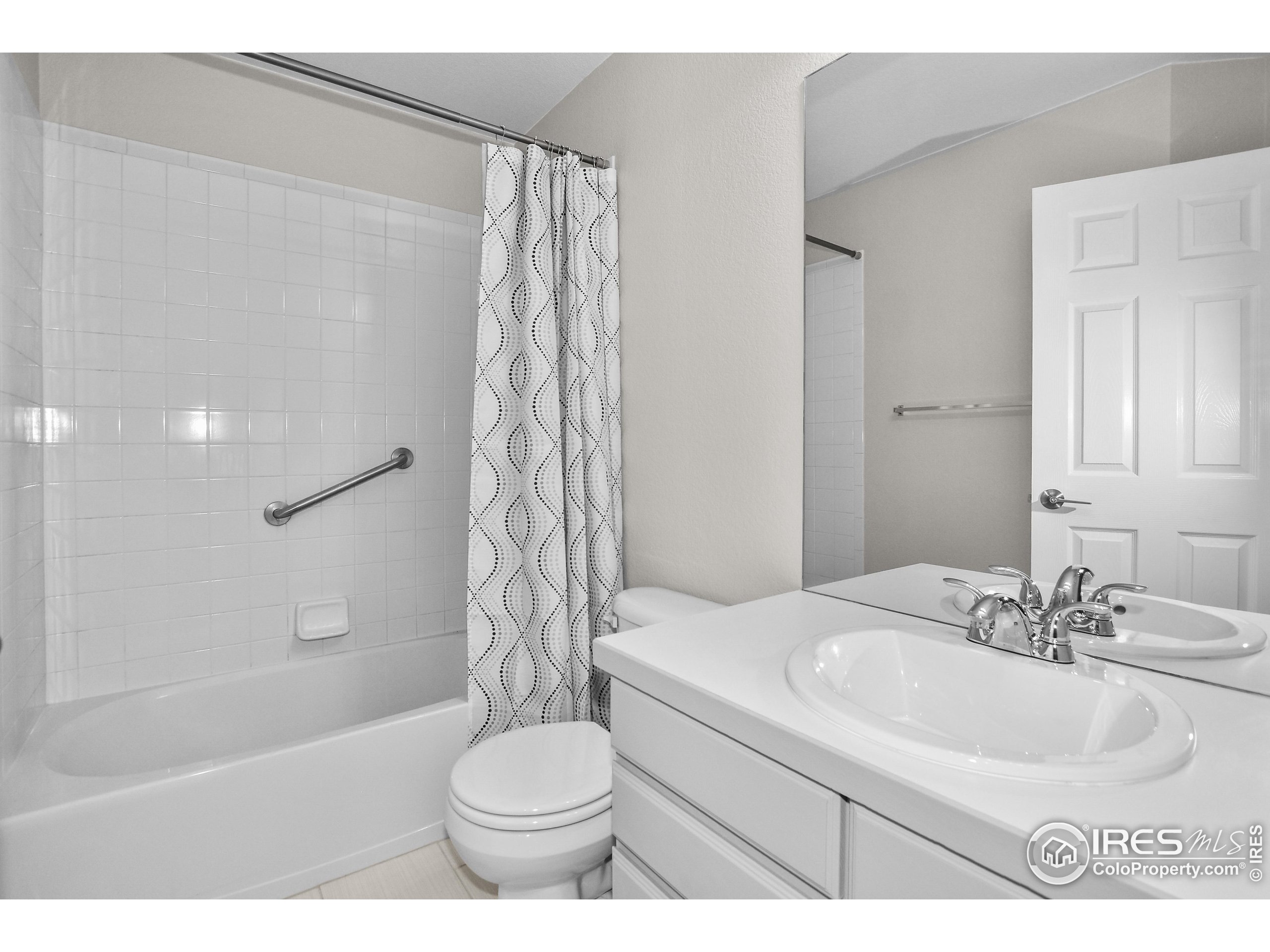 1680 Foxbrook Way Fort Collins, CO 80526 - Photo 8 of 42 a bathroom with a sink toilet and shower