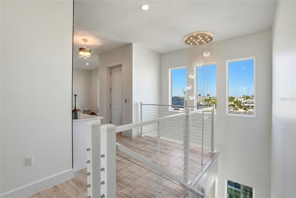 534 Crystal Drive Madeira Beach, FL 33708 - Photo 20 of 68 a view of a kitchen from the hallway
