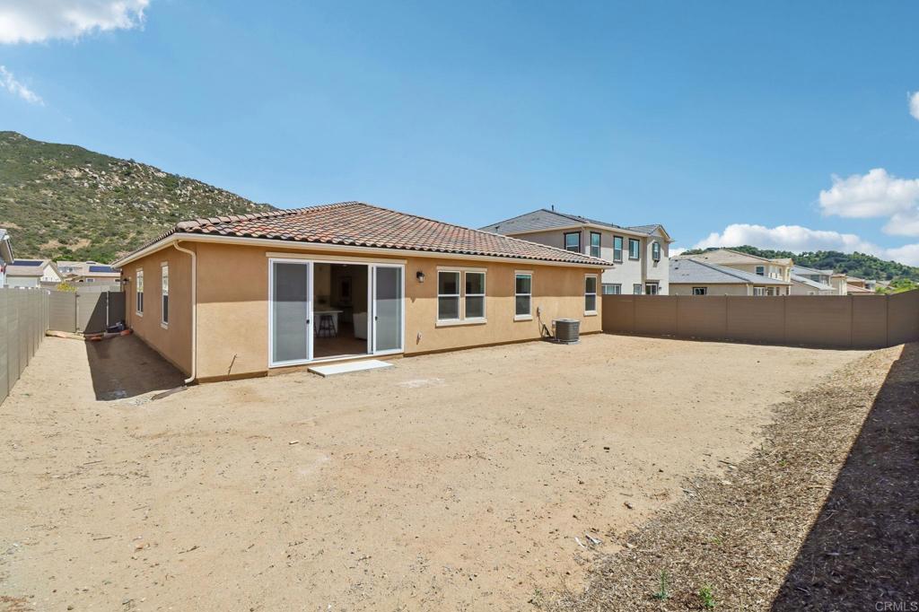 3521 Butler Place Escondido, CA 92027 - Photo 49 of 50 a front view of a house with a yard