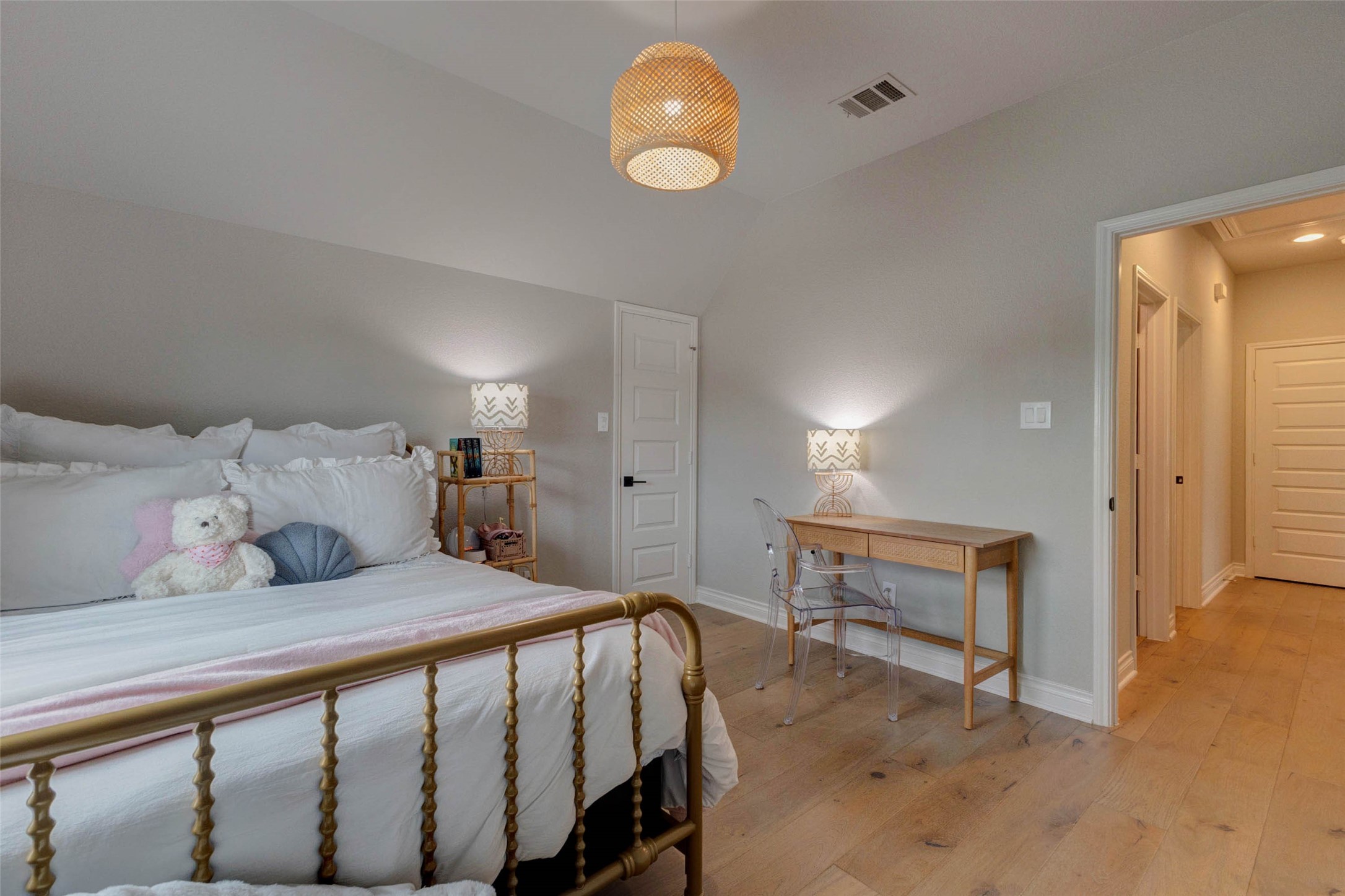 4303 Tupelo Leaf Court Manvel, TX 77578 - Photo 44 of 50 a bedroom with a bed and a chandelier