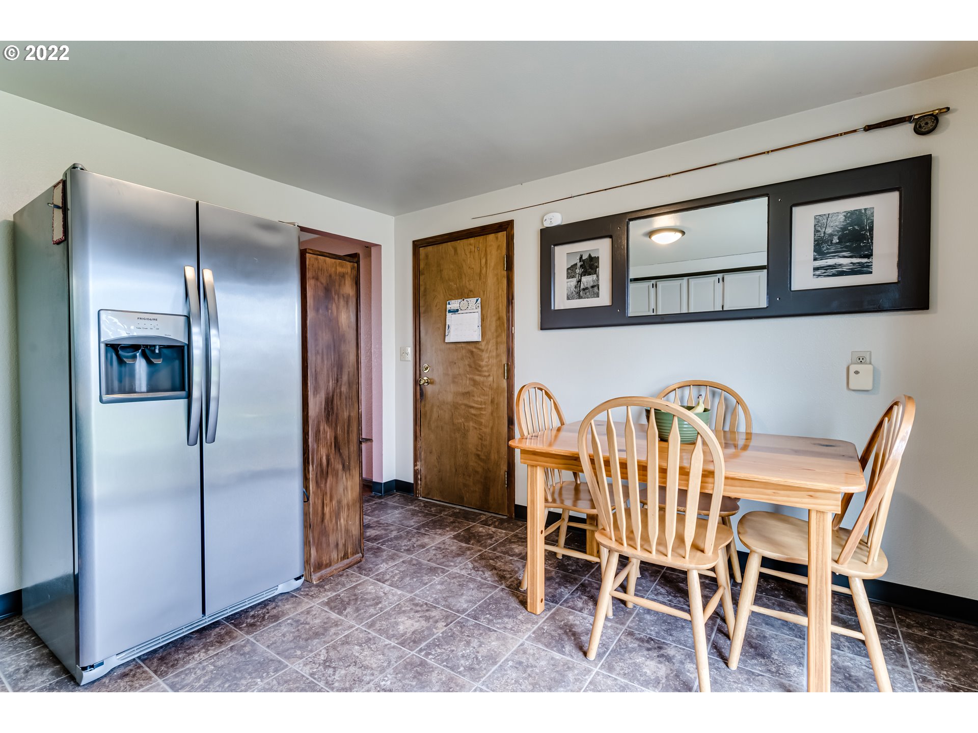 2634 J Street Springfield, OR 97477 - Photo 8 of 20 a view of a dining room with furniture window and wooden floor