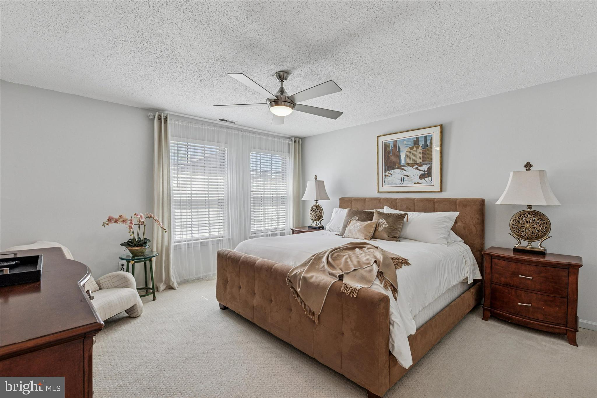 8 Hopkinson Court Chesterbrook, PA 19087 - Photo 13 of 25 a bedroom with a bed and wooden floor