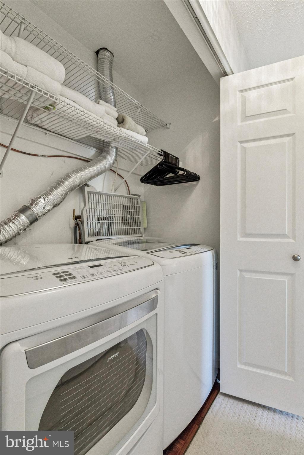 8 Hopkinson Court Chesterbrook, PA 19087 - Photo 18 of 25 a close view of laundry room with a washer and dryer