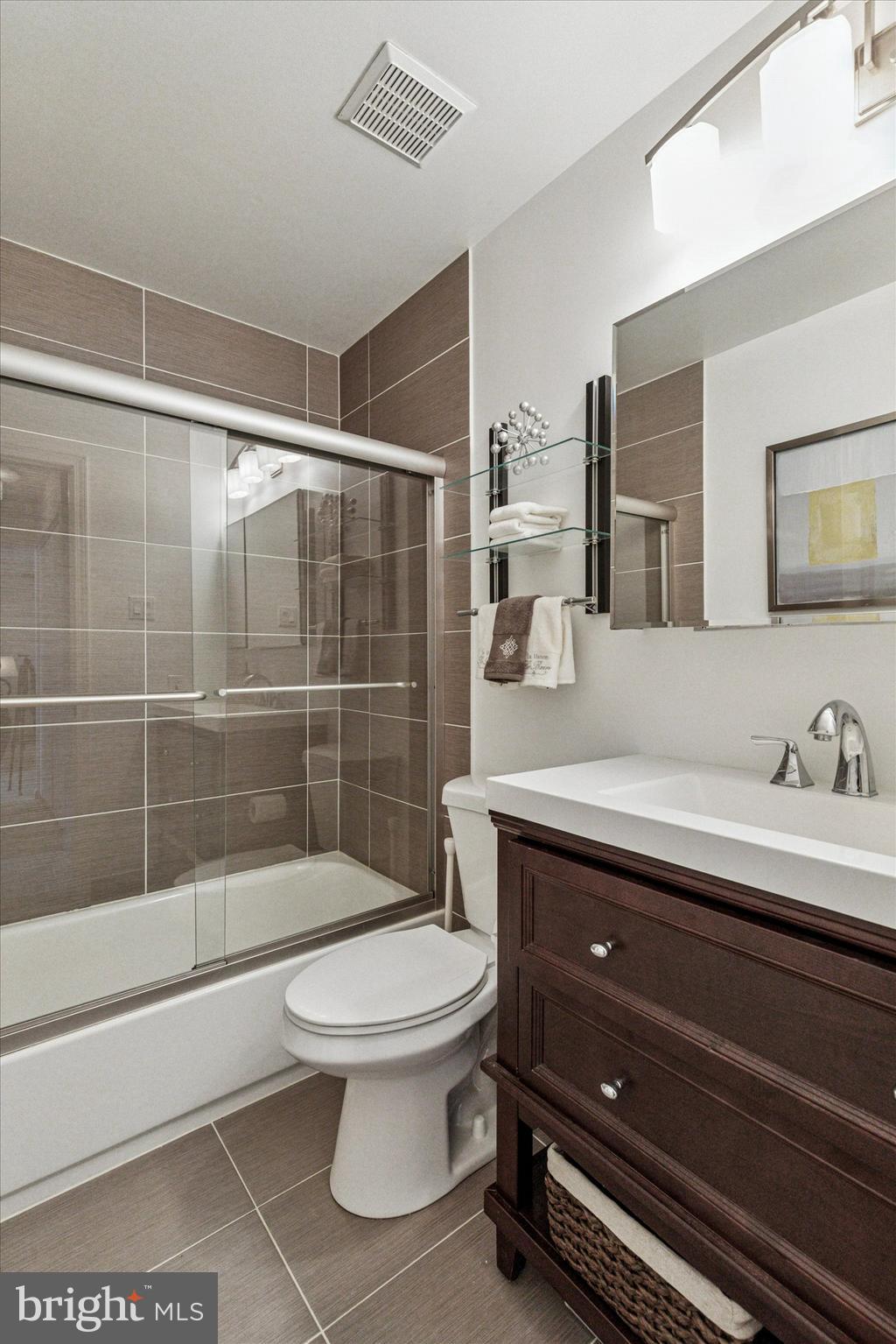 8 Hopkinson Court Chesterbrook, PA 19087 - Photo 19 of 25 a bathroom with a sink a toilet and shower