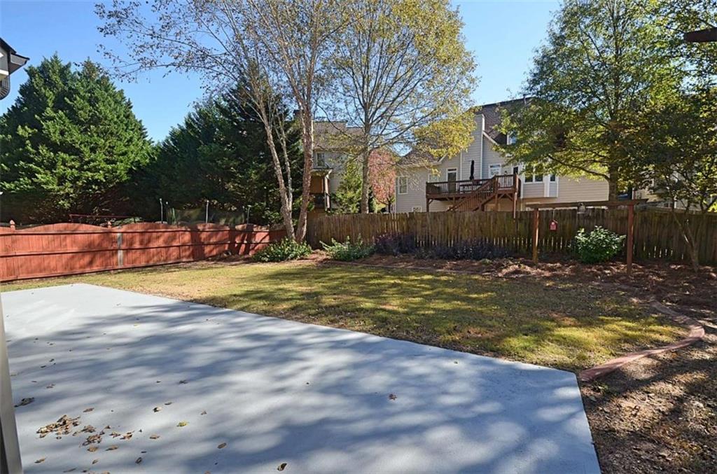 101 Whitegrass Way Grayson, GA 30017 - Photo 29 of 41 a view of swimming pool with lawn chairs and plants