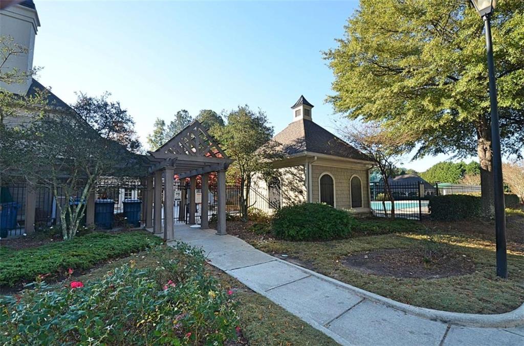 101 Whitegrass Way Grayson, GA 30017 - Photo 34 of 41 a front view of a house with a yard and trees