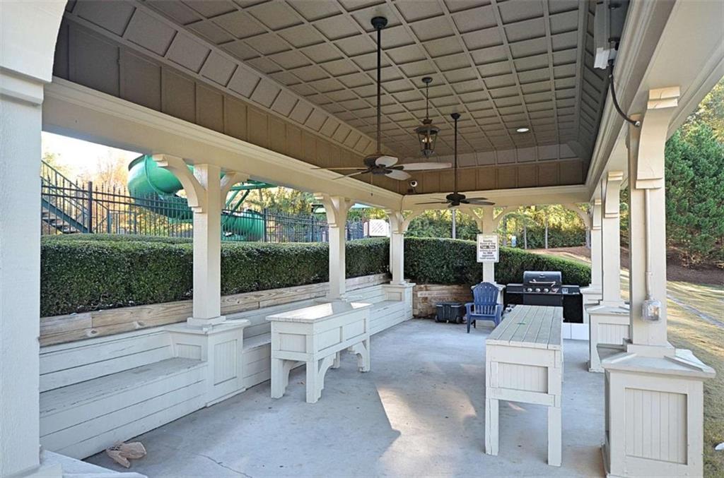 101 Whitegrass Way Grayson, GA 30017 - Photo 40 of 41 a building outdoor space with patio furniture and garden view