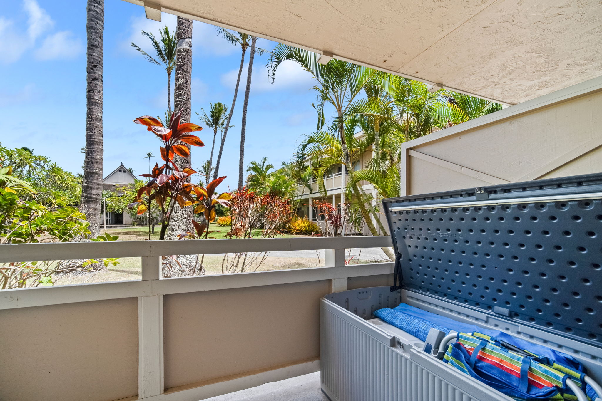 525 Aleka Loop, Unit H7 Kapaa, HI 96746 - Photo 17 of 30 a view of a door and chair in the balcony