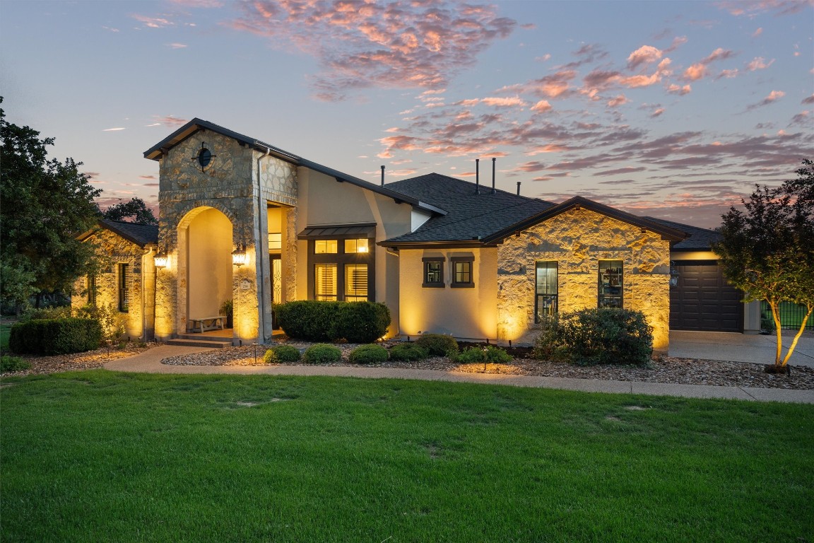 216 Estrella Crossing Georgetown, TX 78628 - Photo 1 of 1 a front view of a house with a yard