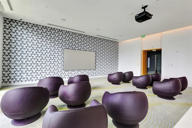 a view of a living room and entry way