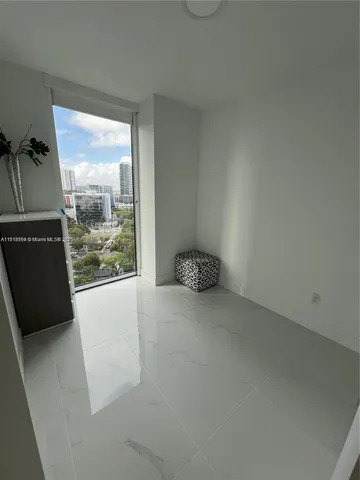 a bathroom with a double vanity sink toilet and shower