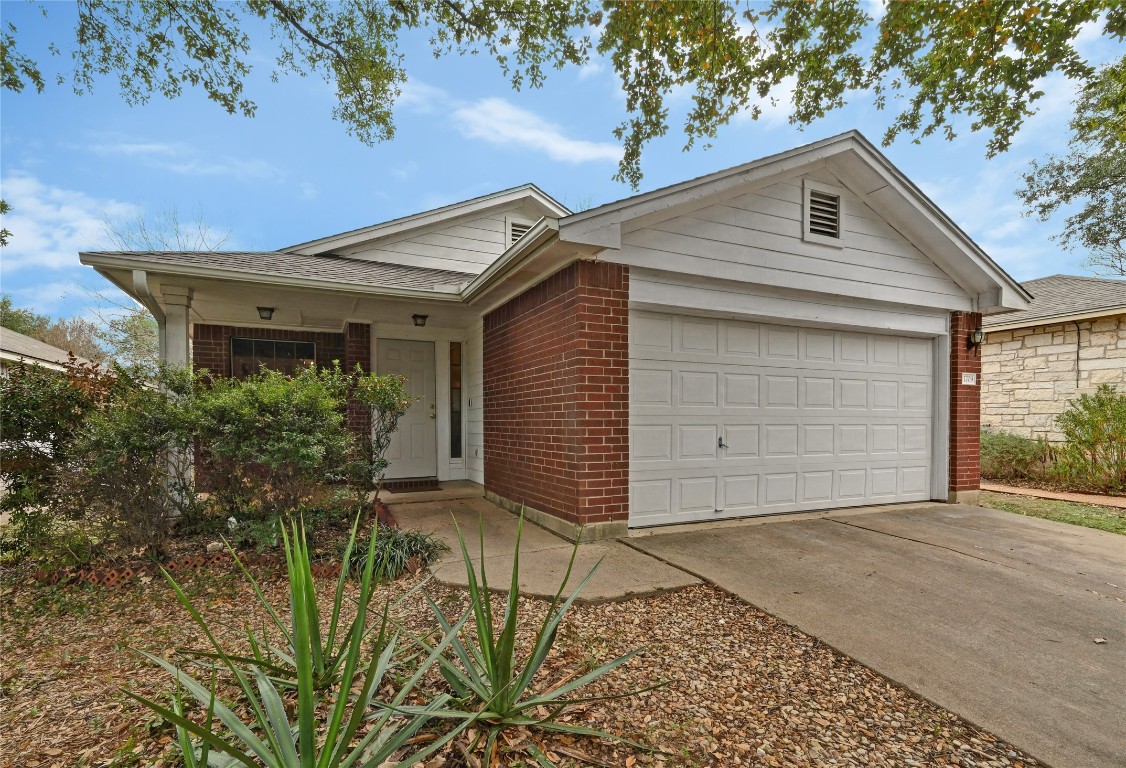 1709 Friars Tale Lane Austin, TX 78748 - Photo 1 of 24 a front view of house with yard