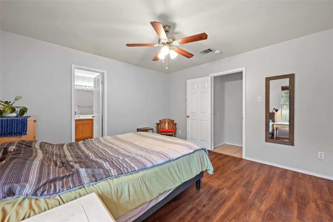 1709 Friars Tale Lane Austin, TX 78748 - Photo 12 of 24 a bedroom with a bed and a window