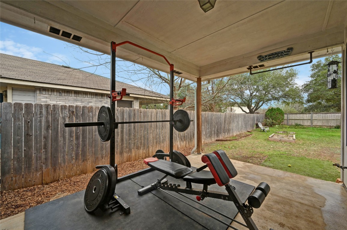 1709 Friars Tale Lane Austin, TX 78748 - Photo 19 of 24 a view of backyard with a flat tv screen and a swing chair