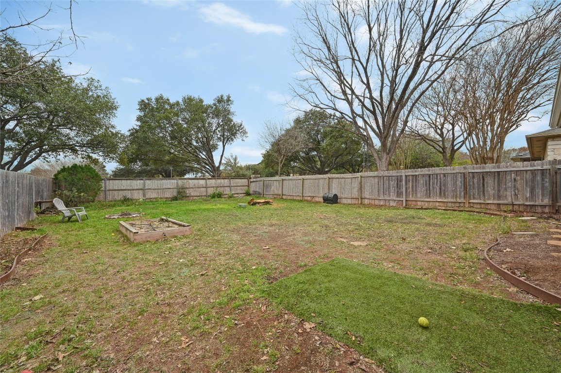 1709 Friars Tale Lane Austin, TX 78748 - Photo 20 of 24 a view of a yard with a large tree