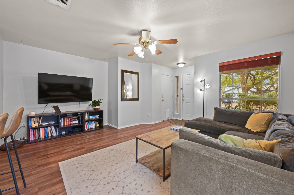 1709 Friars Tale Lane Austin, TX 78748 - Photo 5 of 24 a living room with furniture and a flat screen tv