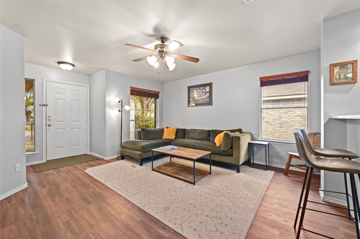 1709 Friars Tale Lane Austin, TX 78748 - Photo 6 of 24 a living room with furniture and a window