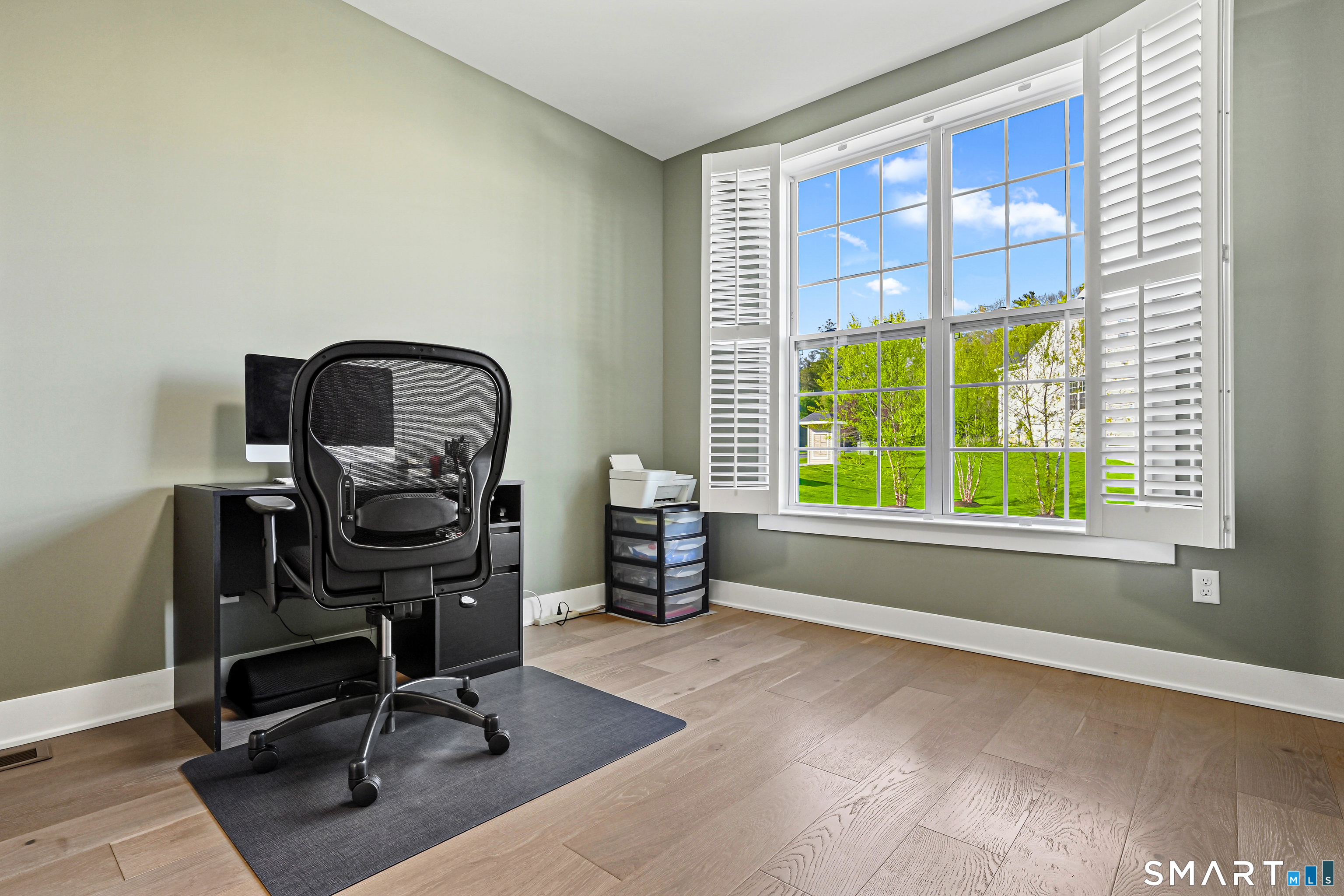 19 Enclave Circle, Unit 19 Newtown, CT 06470 - Photo 21 of 39 a view of a workspace with furniture and a window