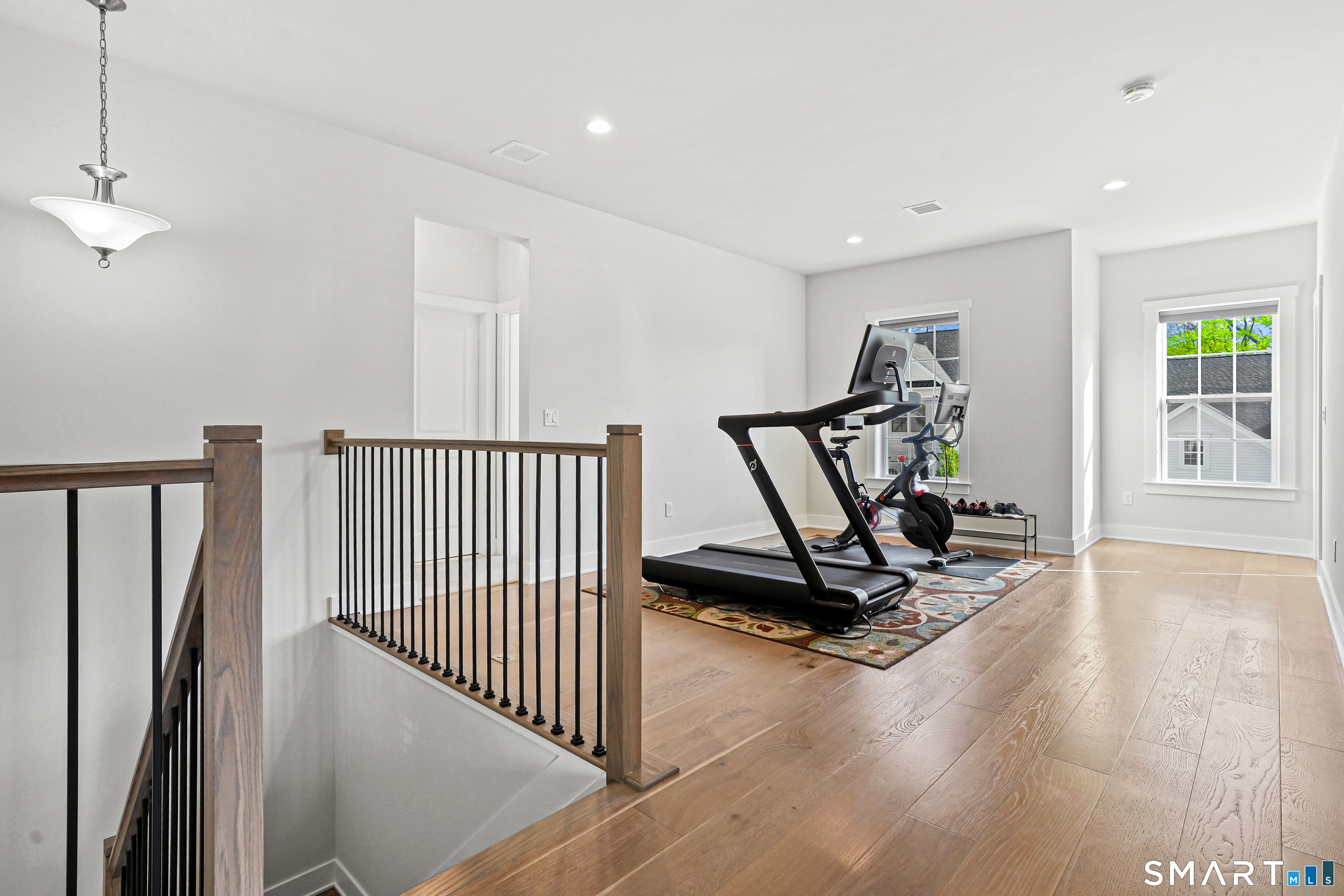 19 Enclave Circle, Unit 19 Newtown, CT 06470 - Photo 24 of 39 a view of a room with gym equipment