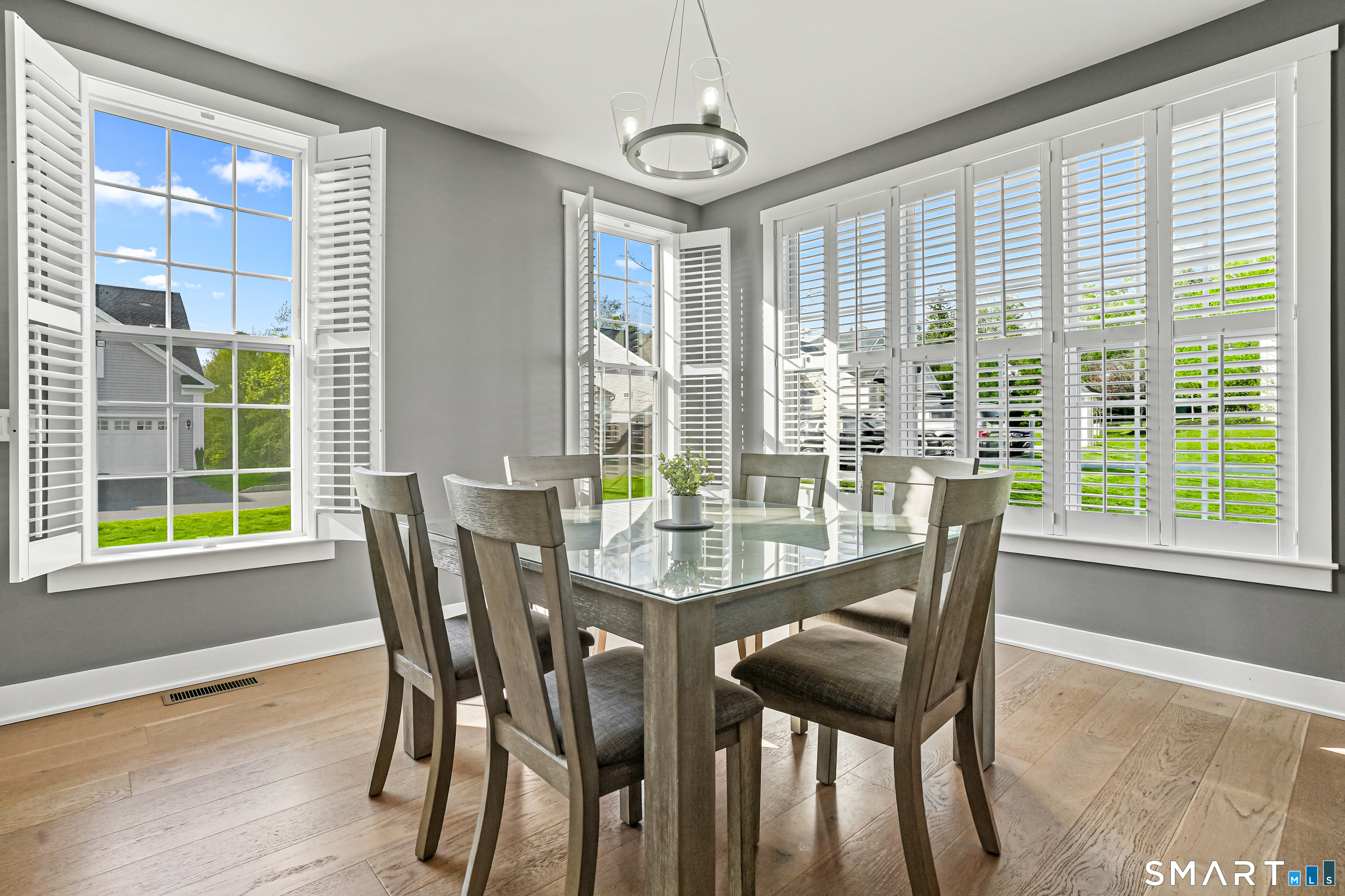 19 Enclave Circle, Unit 19 Newtown, CT 06470 - Photo 5 of 39 a view of a dining room with furniture and window