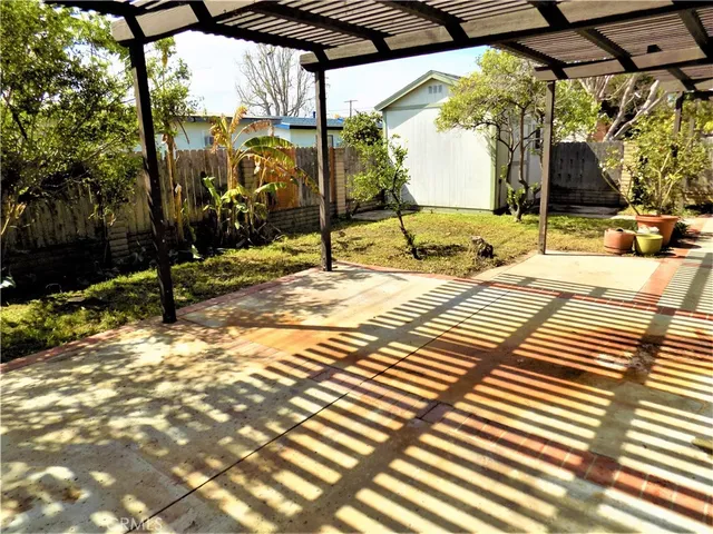 a view of a backyard of a house