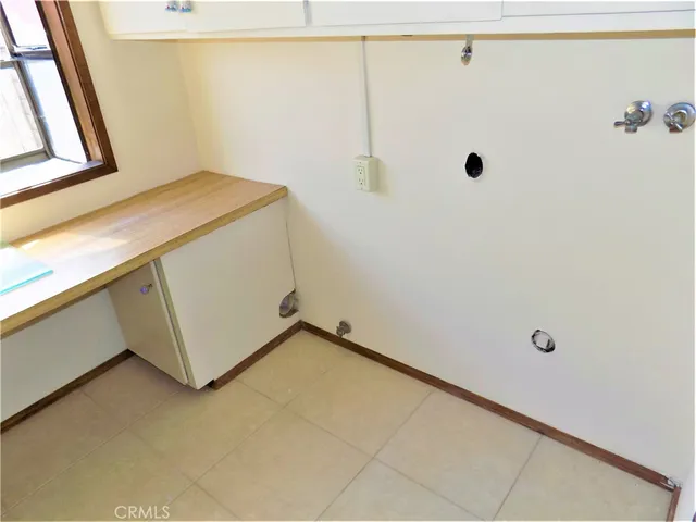a utility room with a window