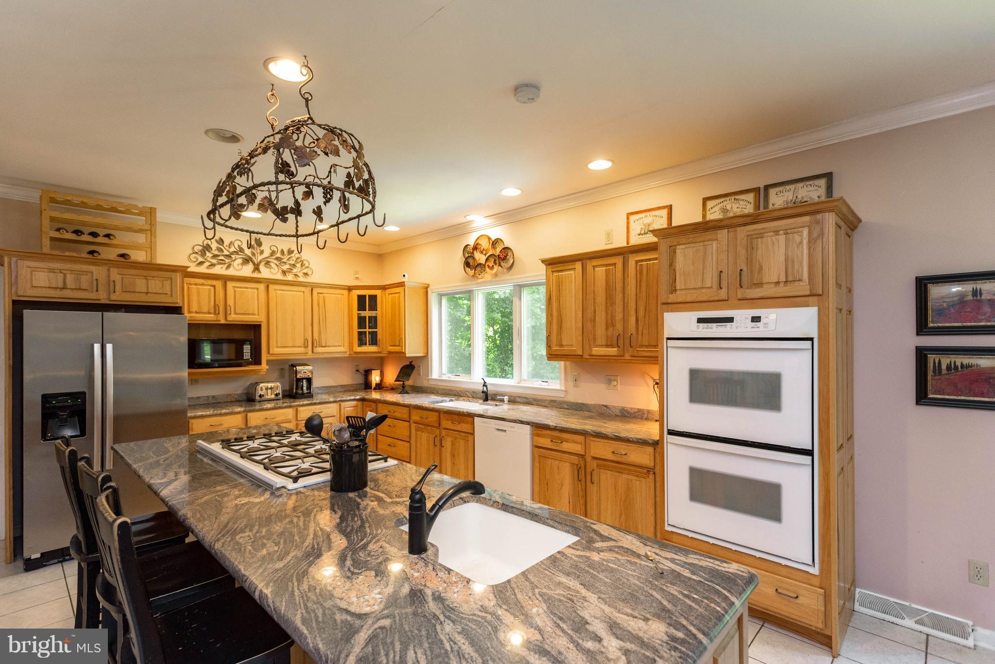 1158 Quarry Road Pylesville, MD 21132 - Photo 11 of 30 a kitchen with a refrigerator a stove a sink and dishwasher