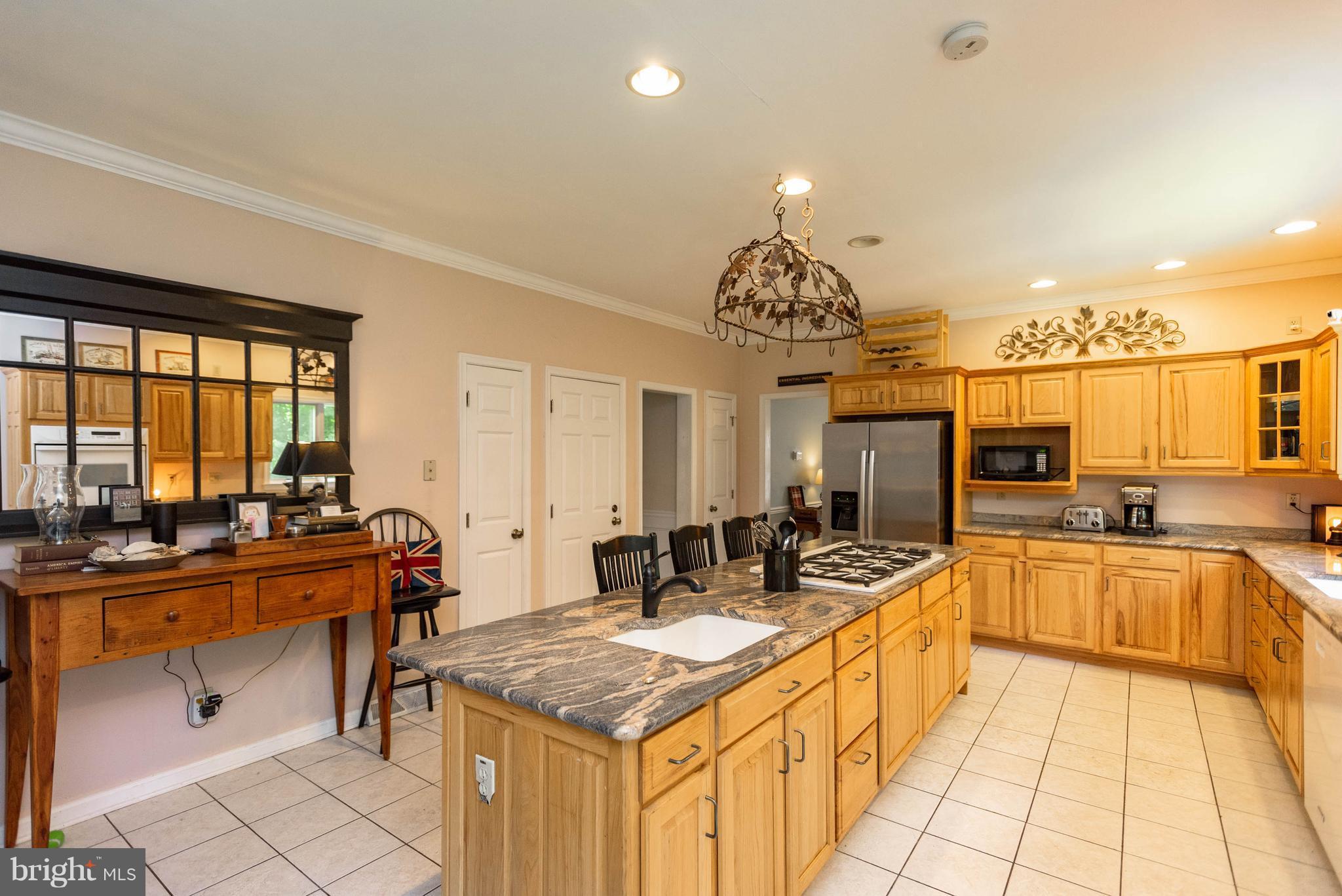 1158 Quarry Road Pylesville, MD 21132 - Photo 12 of 30 a kitchen with stainless steel appliances granite countertop a sink and cabinets