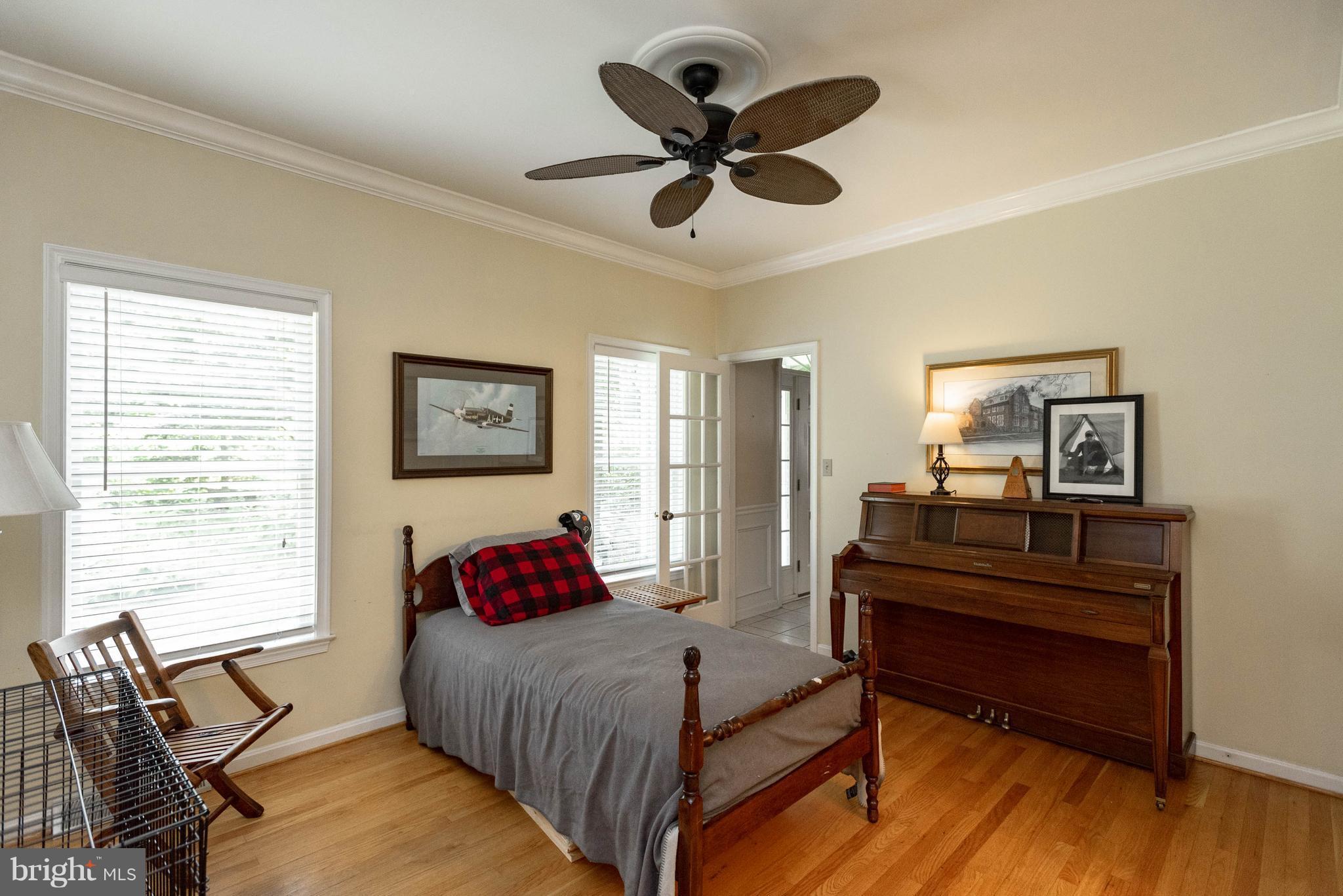 1158 Quarry Road Pylesville, MD 21132 - Photo 14 of 30 a bedroom with a bed and a chandelier
