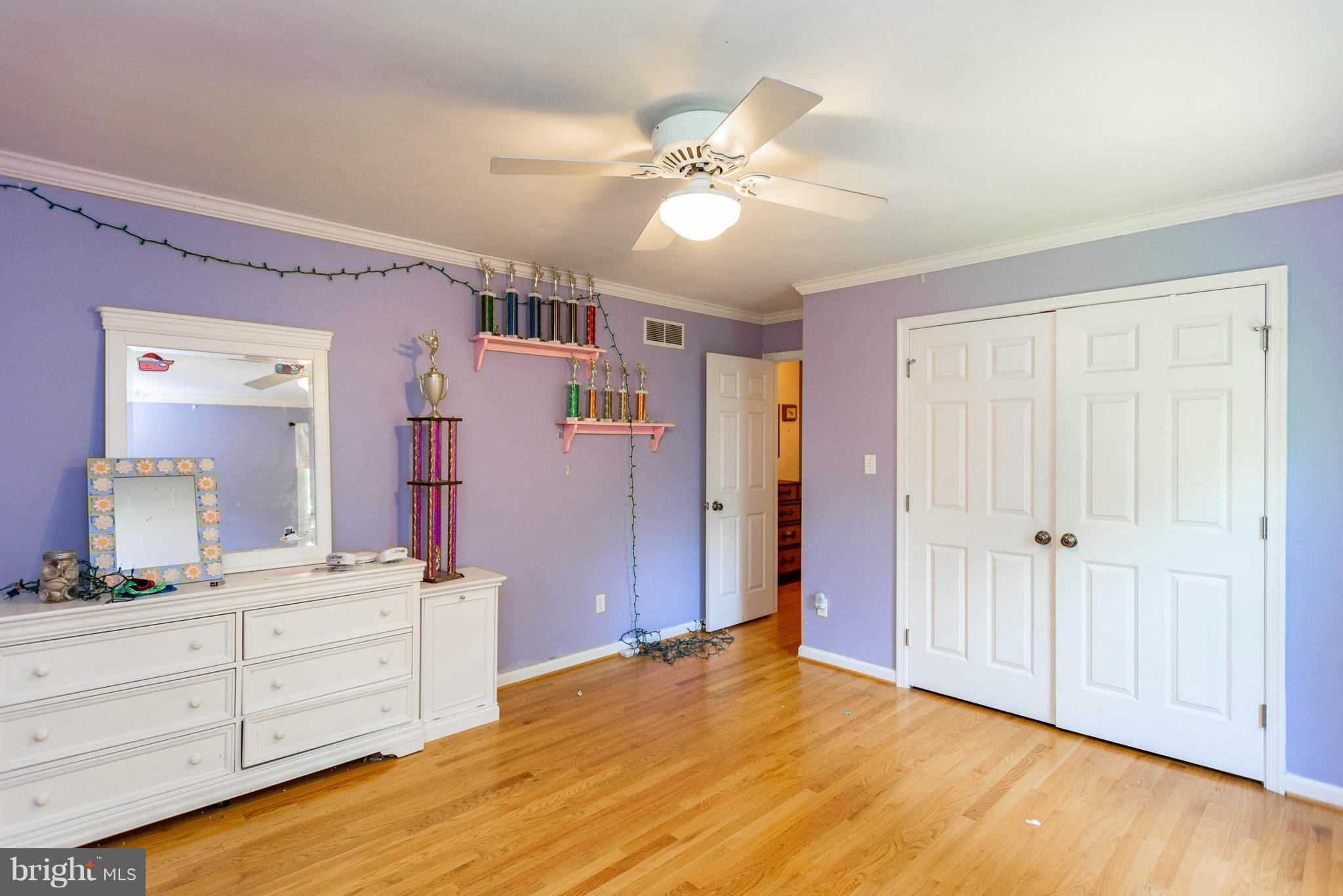 1158 Quarry Road Pylesville, MD 21132 - Photo 21 of 30 a view of an empty room with cabinet and wooden floor