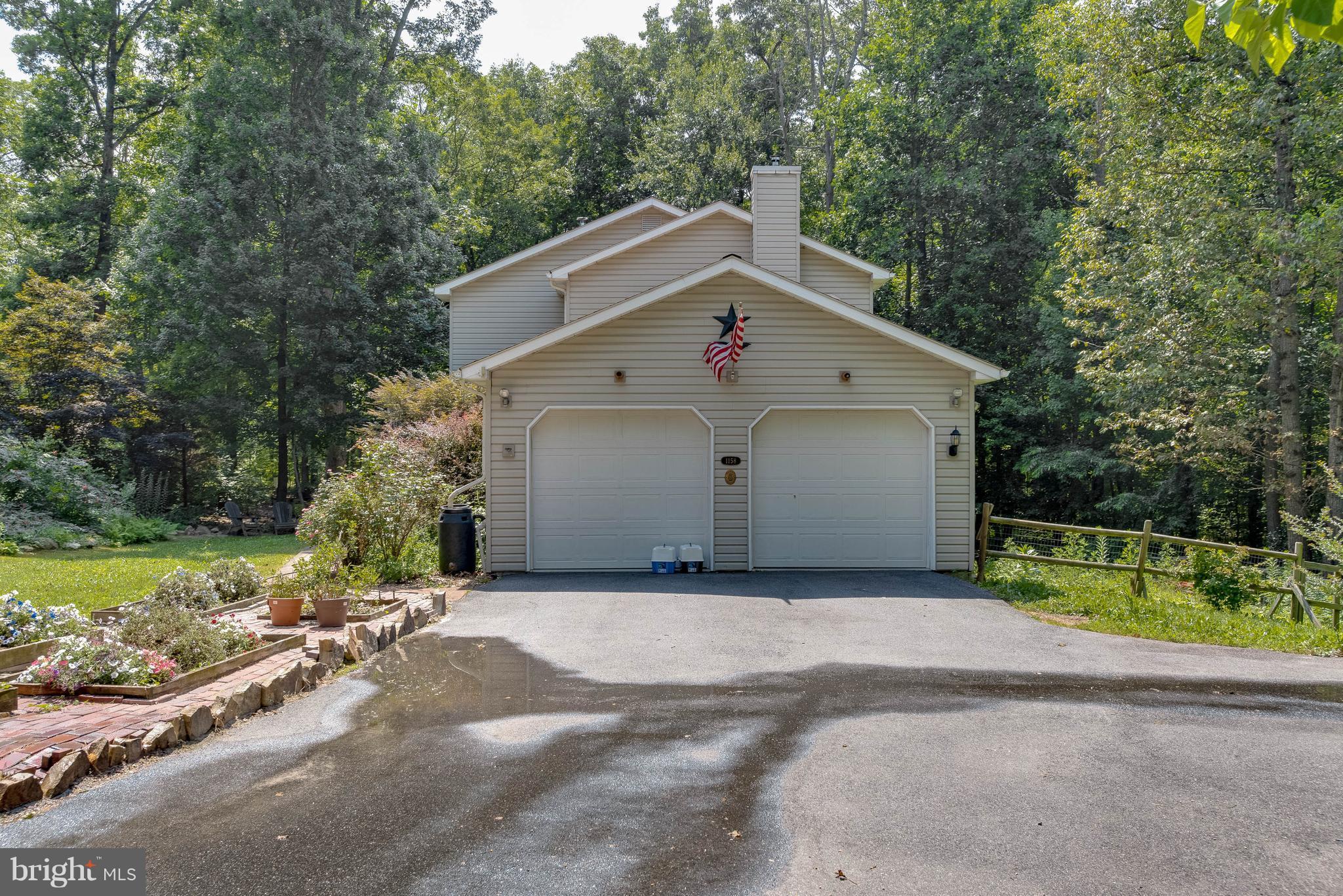 1158 Quarry Road Pylesville, MD 21132 - Photo 26 of 30 a view of a house with a yard and large trees
