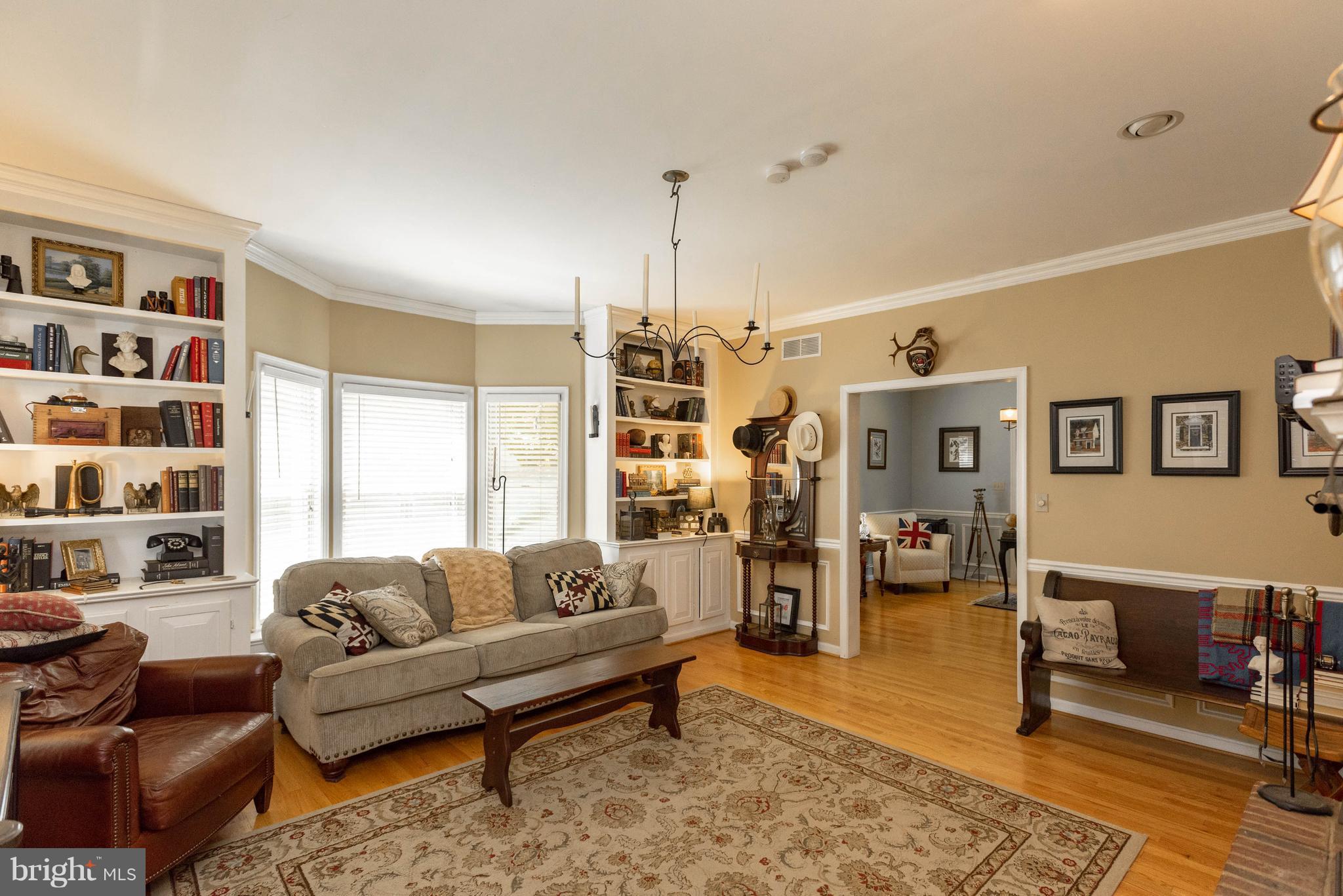 1158 Quarry Road Pylesville, MD 21132 - Photo 6 of 30 a living room with furniture and a chandelier