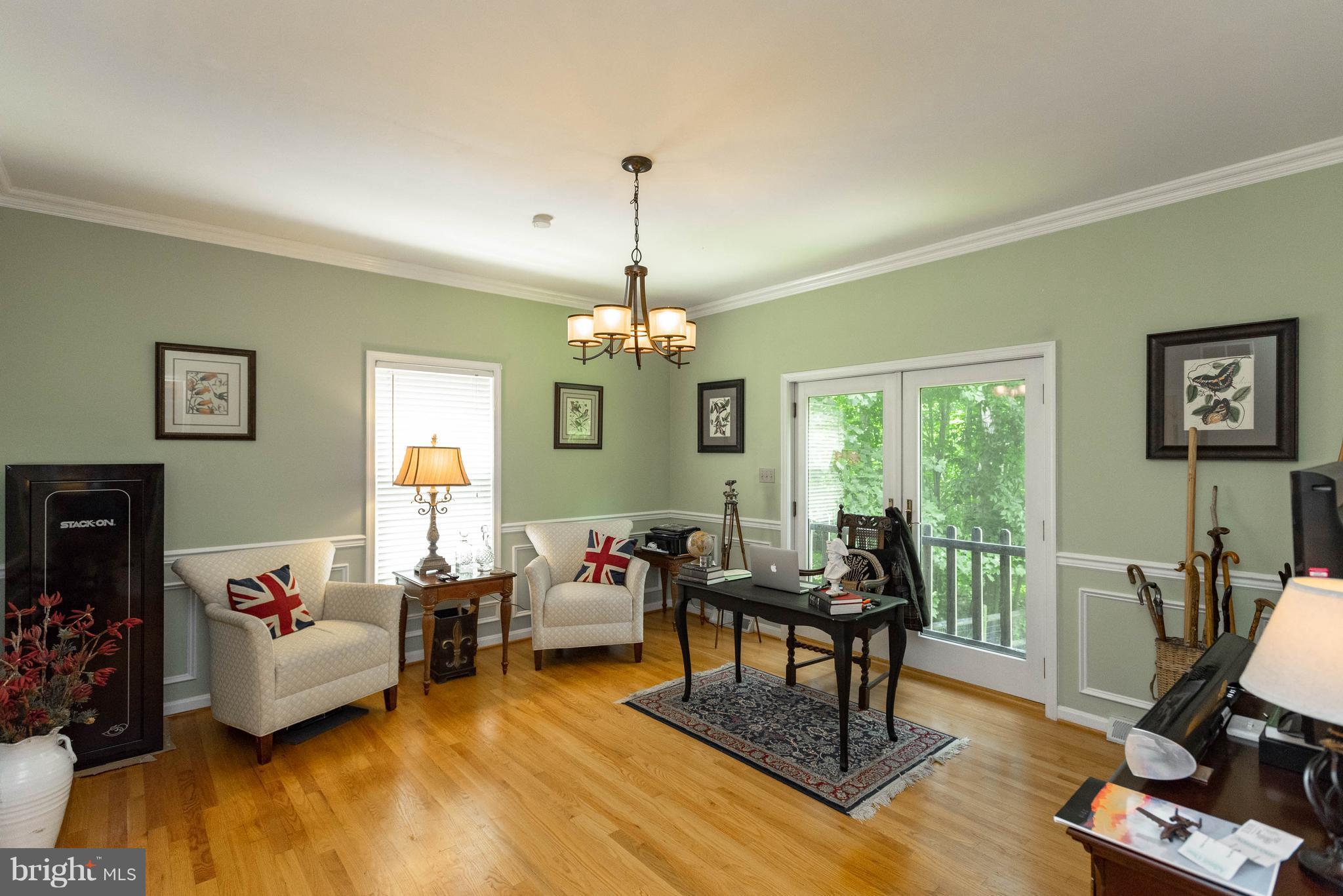 1158 Quarry Road Pylesville, MD 21132 - Photo 9 of 30 a living room with furniture and a chandelier