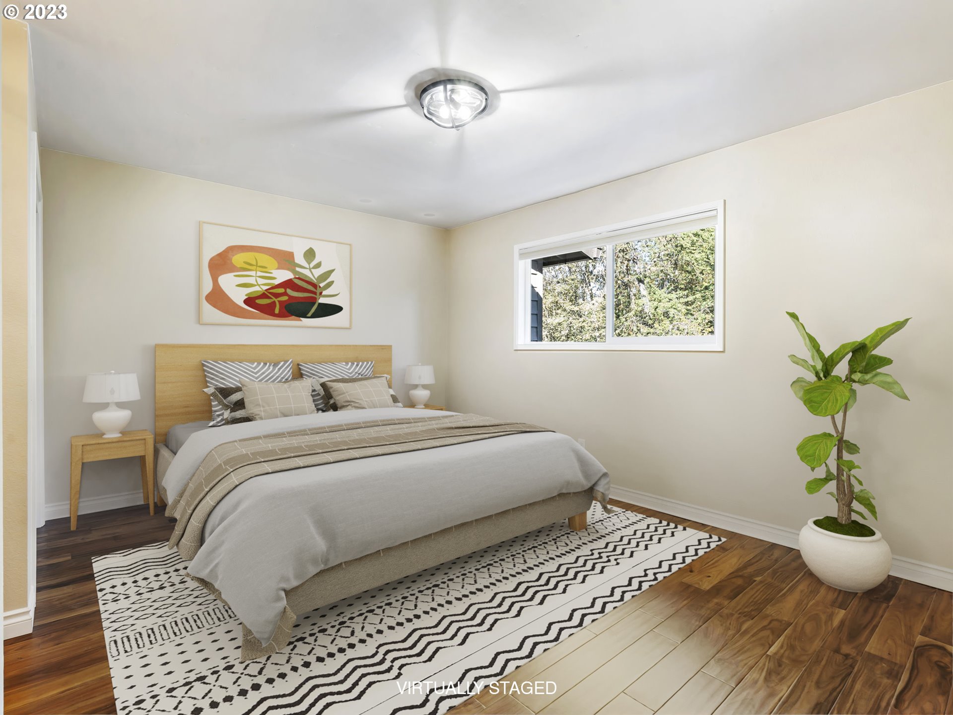 3851 Southwest Canby Street Portland, OR 97219 - Photo 6 of 32 a bedroom with a bed and a painting on the wall