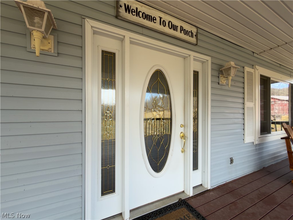 17377 Murphy Road Amesville, OH 45711 - Photo 10 of 43 Doorway to property with covered porch